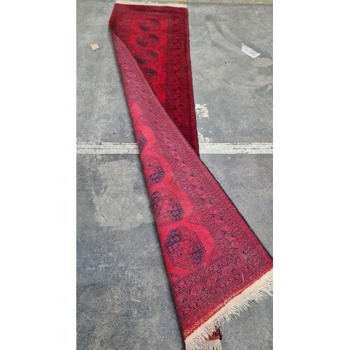 947 - Star Lot : A marvelous hand knotted woolen hall runner featuring an intricate geometric pattern in s... 