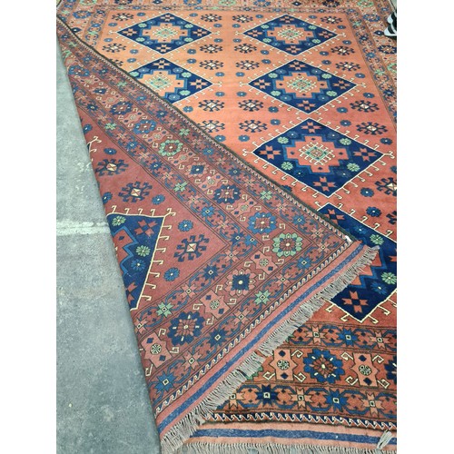 948 - Star lot : An elegant and very large hand knotted 100% woolen rug from Kashgari featuring an intrica... 