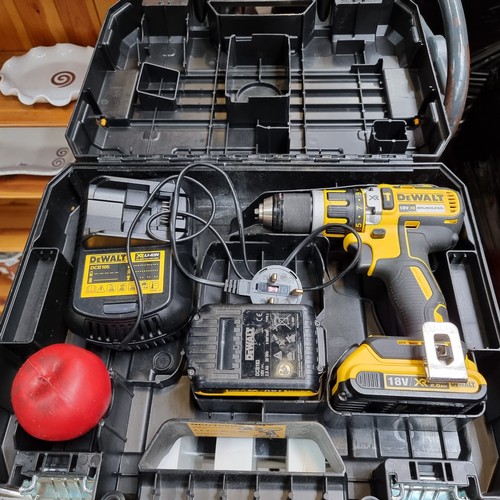 854 - A DeWalt 18V XR compact hammer drill model DCD795. With two 18V XR Li-Ion 2.0AH batteries and XR Li-... 