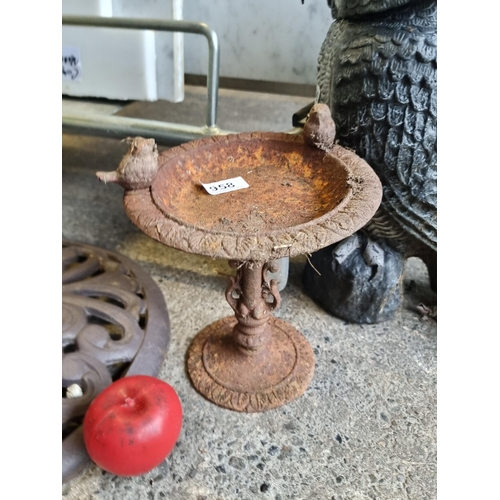 958 - A vintage metal bird bath. You could clean it up or leave it distressed.