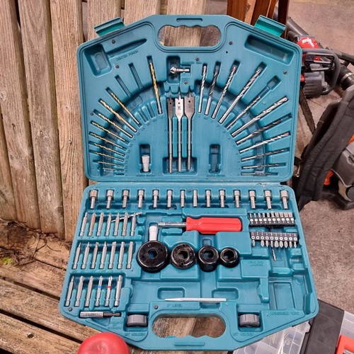 857 - A Makita double hard tool case containing approx. 65 tools including drill bits in varying sizes and... 