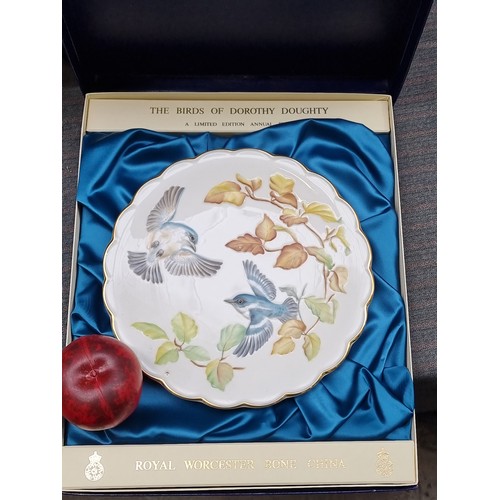 393 - A fabulous collection of twelve 1970s/80s Royal Worcester limited annual edition dessert plates from... 