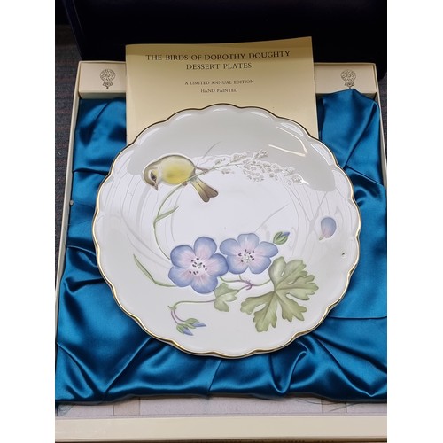 393 - A fabulous collection of twelve 1970s/80s Royal Worcester limited annual edition dessert plates from... 