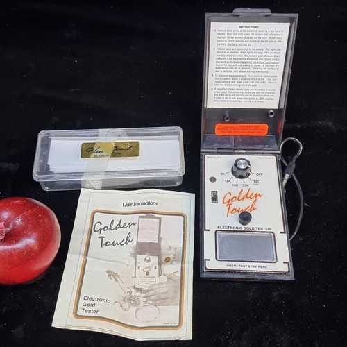 943 - Star Lot : A Golden Touch electronic gold tester complete with user Instructions  and a box containi... 