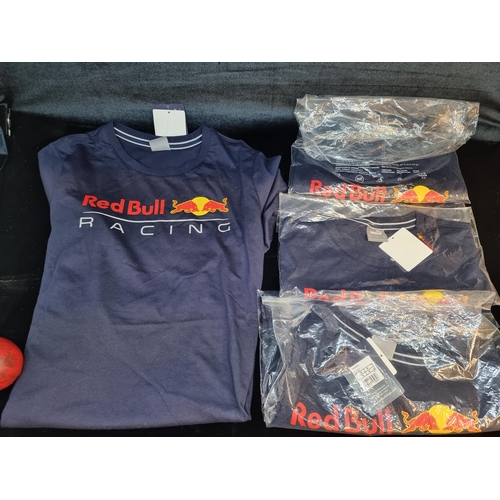 140 - Four brand new Puma Red Bull men's navy racing t-shirts in size M. All with tags.