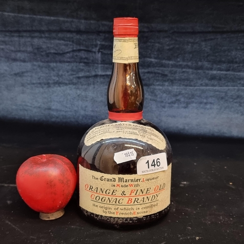 146 - Star Lot: A sealed 1980s 1 quart bottle of Grand Marnier Liqueur Orange & Fine Old Cognac Brandy. Ev... 