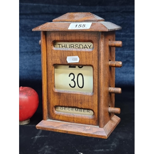 155 - A large vintage  desktop calendar with well made wooden case and dates on rolls of paper held on woo... 