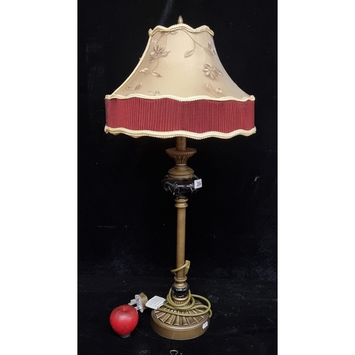 204 - A tall stylish Neo classical style lamp with elaborate shade.