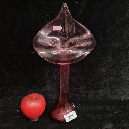 206 - A beautiful Victorian  hand blown cranberry art glass in the form of a calla lily. Cranberry glass i... 