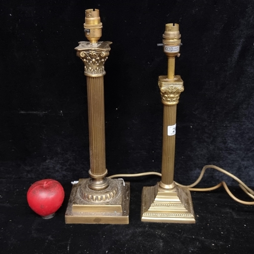 207 - Two brass  column lamps including a Laura Ashley example.