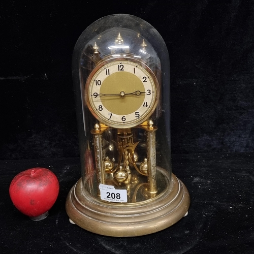 208 - A good vintage German made anniversary dome clock with a glass done and mechanical mechanism. Nice p... 