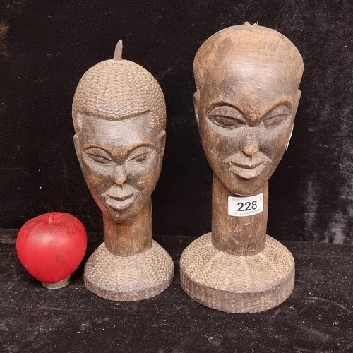 228 - Two vintage hand carved African tribal male figures.