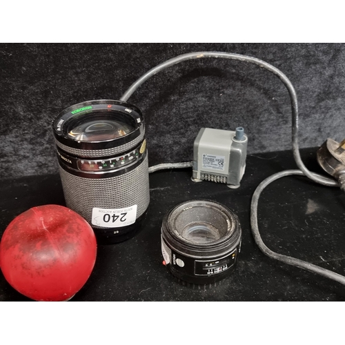 240 - Three items including two Minolta branded camera lens including a large 200mm example and a 50mm exa... 