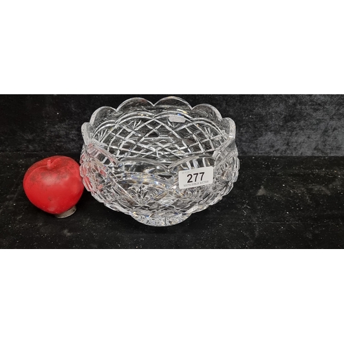 277 - A beautiful large Waterford Crystal pedestal bowl boasting scalloped rim detail.