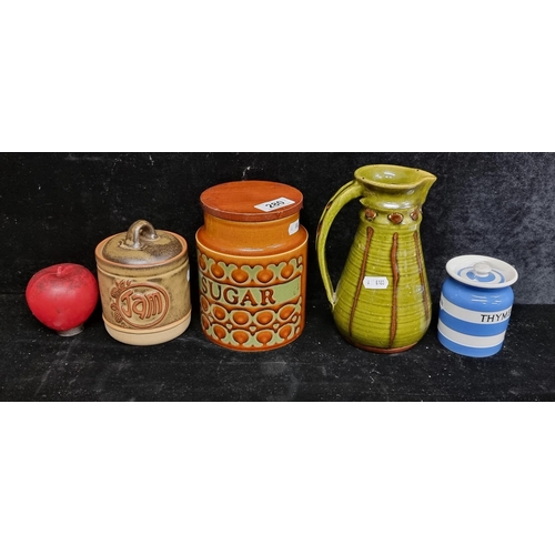 280 - Four studio art pottery mid century ceramic items including a Cornish Ware thyme pot and a large lid... 