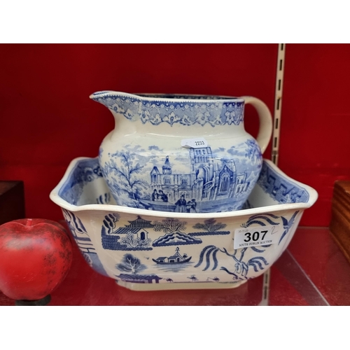 307 - A charming antique blue and white wash basin and jug set.