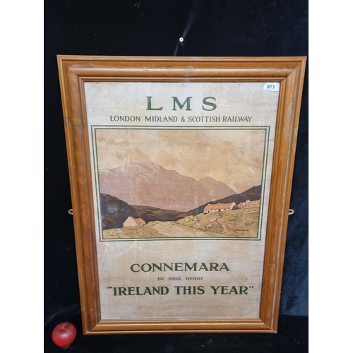 71 - A large print of a vintage poster for the London Midland and Scottish Railway featuring Paul Henry's... 