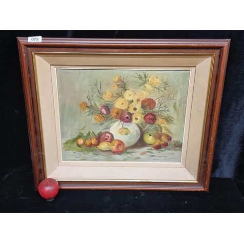 78 - An original oil on canvas painting featuring a still life study of fruit and flowers, beautifully re... 