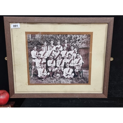 91 - A print of an antique photograph featuring the Clare GAA team from early 1900's. Nicely mounted and ... 