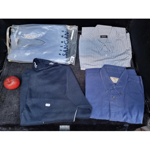 325 - A brand new Pierre Sangan sky blue V neck golf sweater with original tags and bag, a Gabicci Italian... 