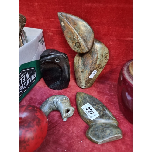 327 - Three heavy marble animal head carvings and a black marble flamingo head carving. All have a wonderf... 