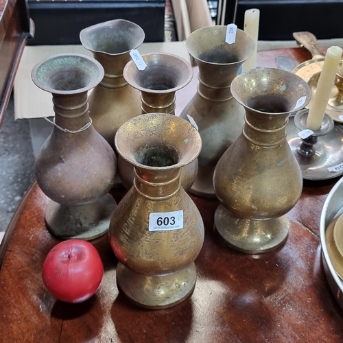 603 - Six vintage brass vases, would come up lovely with a polish.