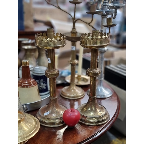 606 - A pair of vintage ecclesiastical brass candlesticks with lovely pierced trefoil tops. Would come up ... 