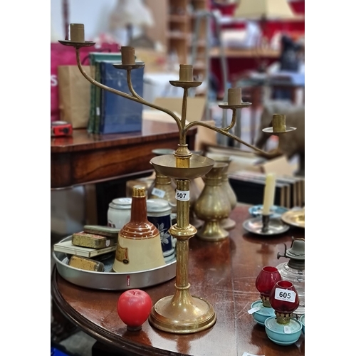 607 - A fabulous vintage brass candelabra with tilted branch, holding space for five candles.