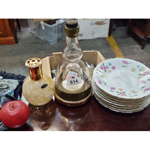 614 - A mixed lot including a hand crafted fragrance lamp, a French musical liqueur bottle decanter and ei... 