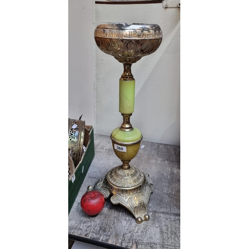 360 - A highly ornate floor standing ashtray with foliate brass elements and green onyx effect detailing. ... 