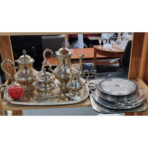 624 - A lovely selection of silver plated table service items including a matching coffee pot, tea pot, cr... 