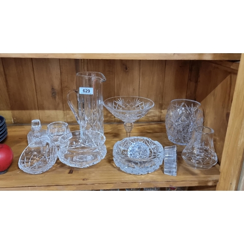 629 - A lovely collection of Crystal ware including some nice Waterford Crystal examples in the form of a ... 