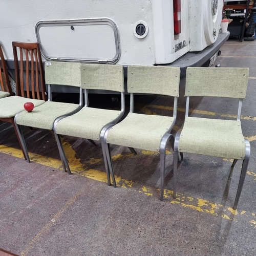 369 - Star Lot: A stylish set of four Esavian designer Mid Century Modern stacking chairs designed by Jame... 