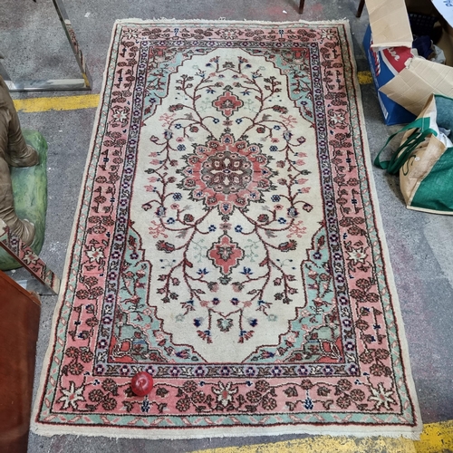 390 - A stunning hand knotted wool Keshan rug in pretty shades of blue, pink and cream with attractive flo... 