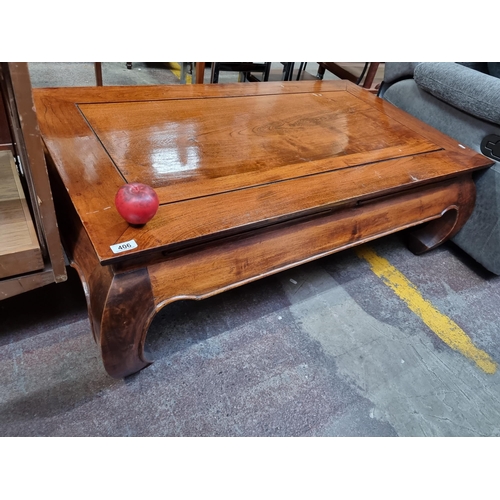 406 - A very handsome large Chinese rosewood coffee table with profusely curved legs and large lovely fini... 