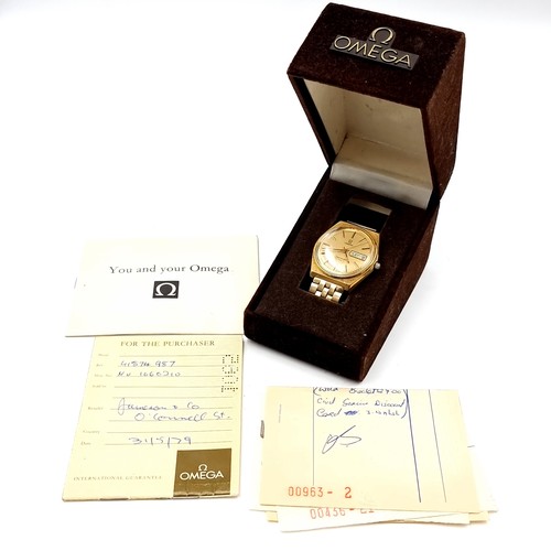 585 - Star Lot : A fine Omega vintage 1979 automatic wristwatch, set with gold metal case and dial with ba... 