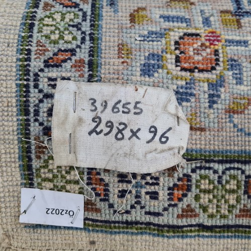 728 - Star Lot : A lovely hand knotted wool hall runner rug in shades of cream and baby blue. L298cm x W96... 