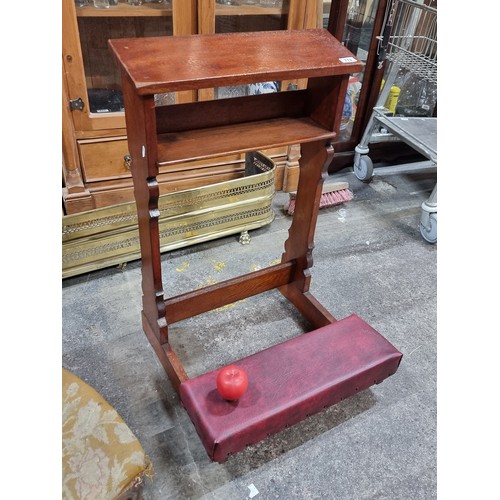 712 - A vintage prayer kneeling bench with padded knee rest and arm rest with shelf to top. Boasting carve... 