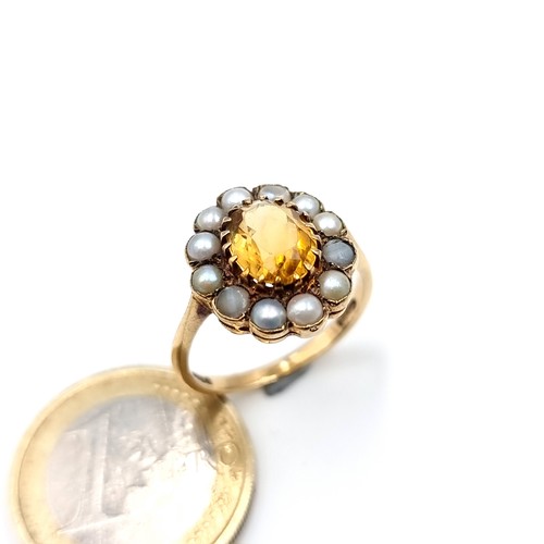 601 - A fine quality 9K gold citrine stone ring with a cultured pearl surround, hallmarks for London, size... 