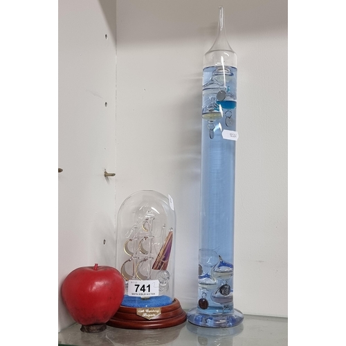 741 - Two glass items including a Galileo thermometer and a hand blown model of an 18th Century Frigate sh... 