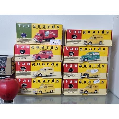 755 - A wonderful collection of eight vintage model toy cars by Vanguards.