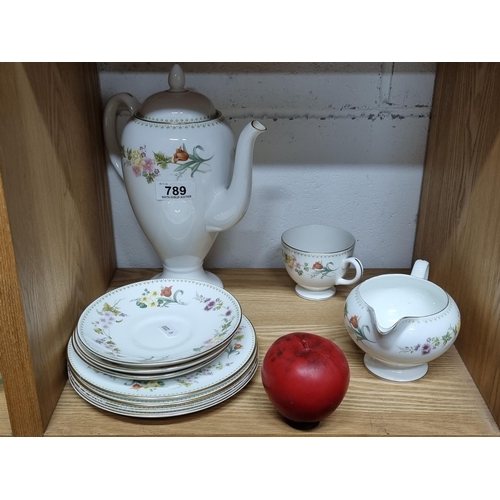 789 - A collection of Wedgwood bone China in the Mirabelle series. Features coffee pot, milk jug, tea cup,... 