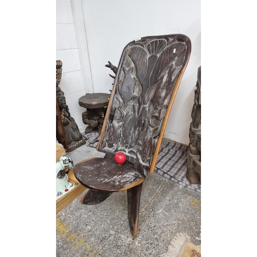 809 - Star Lot : A wonderful and very heavy African carved wooden birthing chair with beautiful bird and f... 