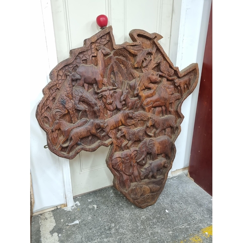 812 - Star Lot : An amazing very large hand carved wooden sculpture of the continent of Africa, featuring ... 