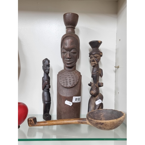 818 - A collection of hand carved wooden African sculptures including a Songye Bishimba figure, along with... 