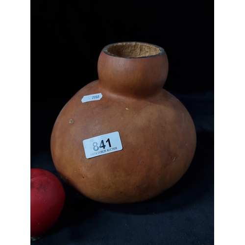 841 - A hand carved and hollowed out gourd, for holding spices and herbs.