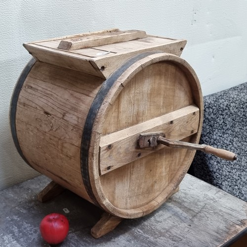 363 - A large vintage butter churn with barrel body containing rotating rods  and metal handle. H48cm