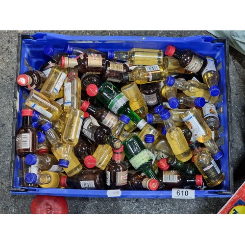 610 - A large collection of approx. 80 miniature liqueur bottles including brands Drambuie and Marie Briza... 