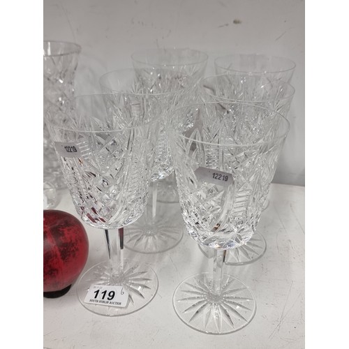 119 - A set of six Waterford Crystal wine glasses in the Clare pattern. A very small loss to one but over ... 