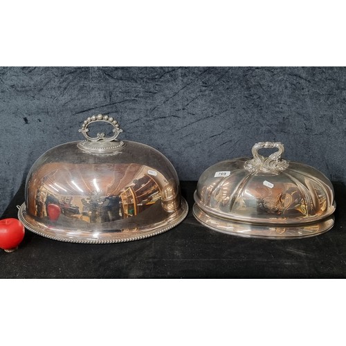 769 - Two beautiful vintage silver plated cloches with ornate handles. Including one from Walker & Hall Sh... 